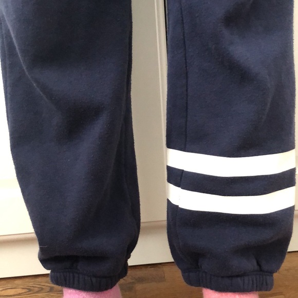 These are navy blue loose fitting sweatpants. - Picture 2 of 4